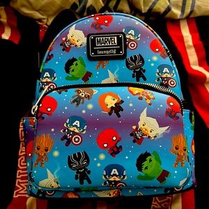 I am selling this great Marvel loungefly I thought I needed but never used it.